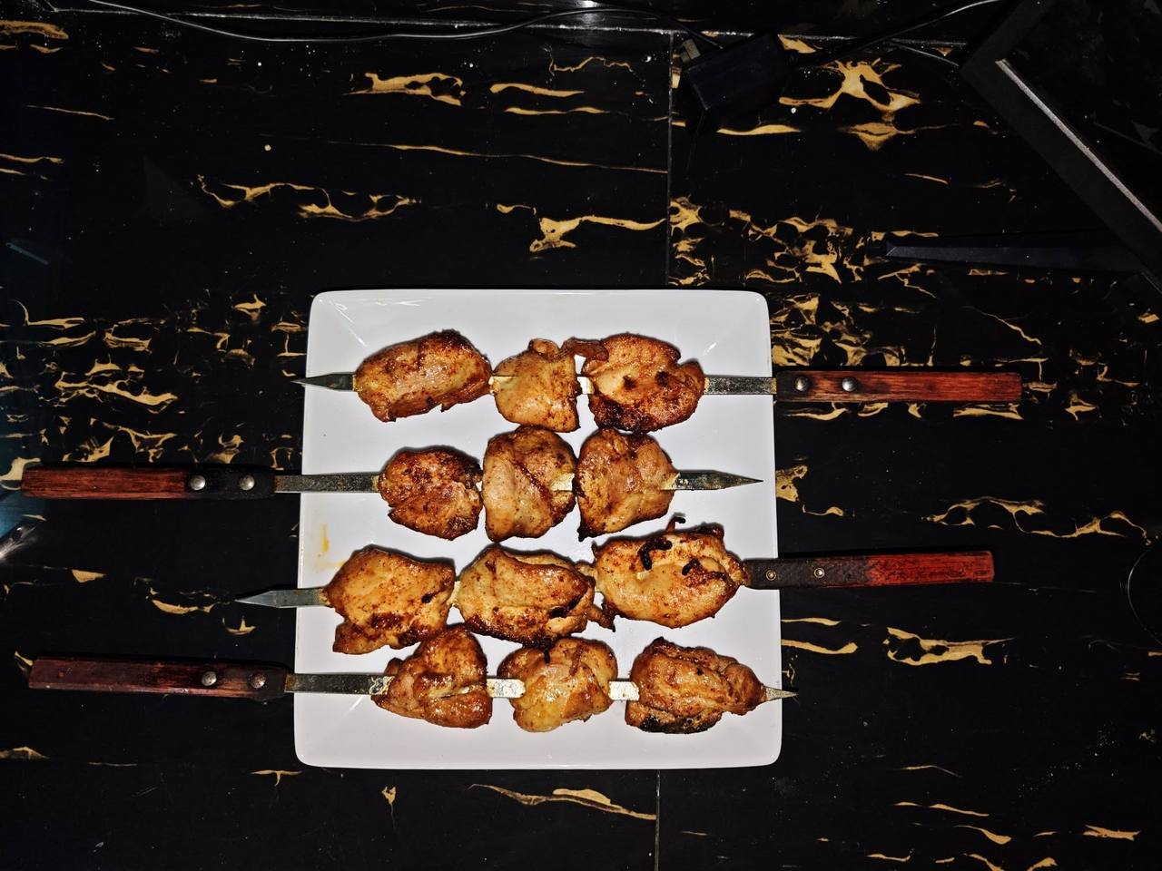 Grilled BBQ chicken served on a plate